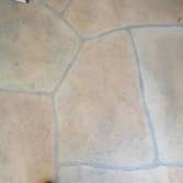 Stamped, colored concrete.