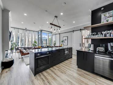 Downtown Chicago Condo Renovation We wanted this downtown condo renovation to feel as elevated as the spectacular view it boasted. We picked and design