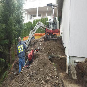 Newcastle Foundation Addition Land clearing, concrete removal, fence removal, foundation excavation