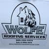 Wolfe Roofing Services logo