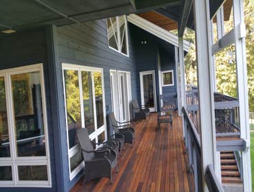 Exterior Staining Exterior Solid Satin on Cedar siding and Re-staining the entire Deck