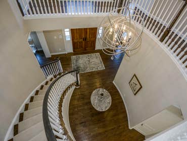 GULICK | CUSTOM Home in McLean The impressive stone and HardiePlank® elevation on our Winthrop really stood out on this corner lot of approximately one