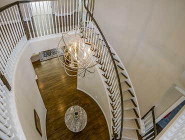 GULICK | CUSTOM Home in McLean The impressive stone and HardiePlank® elevation on our Winthrop really stood out on this corner lot of approximately one