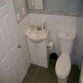 Complete Basement Remodel This was an unfinished basement, we had to get rid of old plumbing and wires. We also set up a waterproofing inside basement