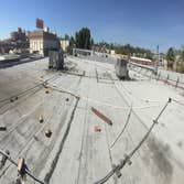 Pasadena Antique Center Reroofed the Pasadena Antique Center with polyurethane foam, two layers of elastomeric coating, and roofing granules.