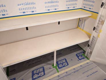Built-in shelving Custom built-in shelving. Shelving sprayed with industrial European Coatings