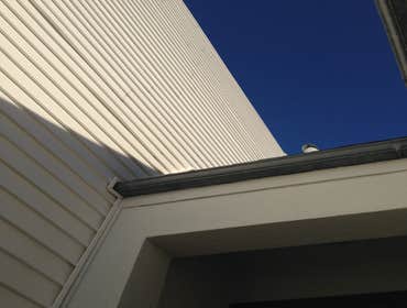 Photos by Big Sky Contracting #3 installed fiber 3/4 board vynyl siding on 3 story old row home just me my and my buddy did this in three weeks all thr