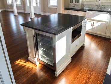 Baine Contracting Inc Project Multiple jobsites - showing kitchens, interior and exterior trim work, new homes, bathrooms, tile work, wood and iron ra