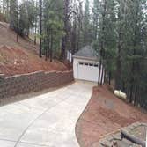 Detached Garage with Exercise Room and 1/2 Bath Design and build a new detached garage with an exercise room and a 1/2 bath.