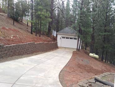 Detached Garage with Exercise Room and 1/2 Bath Design and build a new detached garage with an exercise room and a 1/2 bath.
