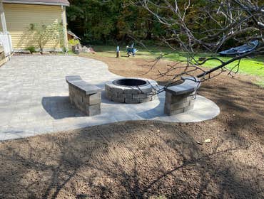 Photos by Steve Danylko Land Service #1 New lawn and landscaping