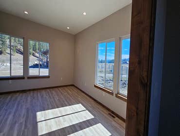 Photos by Wethered Timberworks LLC Dba Wethered Construction #1 Custom Home