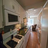 Des Plaines, IL 60018 This project included a kitchen remodel, addition remodel with new bow window, wainscoting and new siding