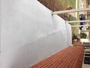 Coated and repaired porch
