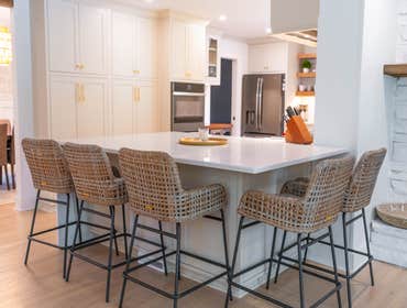 Photos by Albrecht, LLC #1 Through strategic space planning, thoughtful material selections, and custom craftsmanship, this first-floor renovation tran