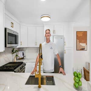 Photos by Ma Properties Construction #1 This bathroom remodel transformed an outdated space into a modern, functional retreat. The project included...