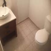 Photos by Coastal View Builder #2 Double bathroom remodel. Was also a deck repair and flooring job.