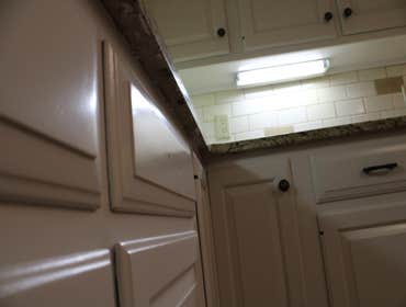 Photos by P&G Painting LLC #1 Strip old paint, prepare the surface by sanding, apply a coat of oil primer and apply two coats of paint with an HVLP Spr