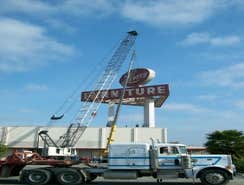 Removal of 10-ton Levitz Sign General Contractor in Charge Removal of 10-ton Levitz Sign General Contractor in Charge