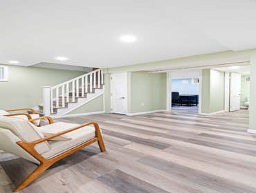 Basement Renovation We refreshed this basement into a recreational space for our clients