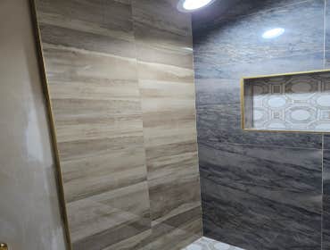Photos by MC ALISTER TILE #1 5 showers total, was hired after another handyman did not water proof correctly, fixed all water proofing and installed 