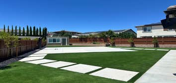 Photos by Cornerstone Hardscape #3 Backyard Hardscape & Artificial Turf Installation
Complete backyard transformation featuring a clean, modern, low-m