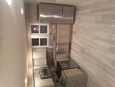 Photos by Cj Lockley Construction #15 Vinyl flooring, painting, refinishing kitchen cabinets, opening up walls