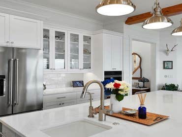 Bells River Residence Nestled in the serene Waterman’s Bluff in Yulee, FL, this exquisite home offers 3,046 sq ft of living space, expanding to a total