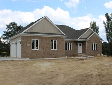 "SOLD" White Cliff Drive Hartland, MI Full Walkout on Golf Course