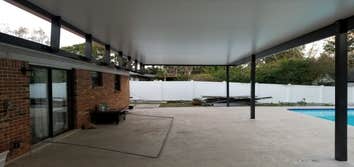 Photos by Orlando City Screening LLC #2 Removal of old pool cage and porch and building new porch covered with elite roof 40 x 18 and new pool enclosur