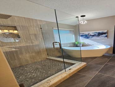 Photos by Trublue of Allen #34 Full master bathroom remodeling. New curb-less shower, bench, niches, freestanding tub, vanity, lighting, flooring, pain