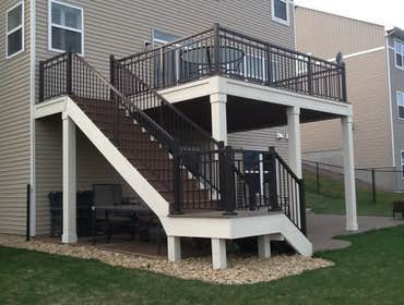 Photos by Custom Home Specialties Inc #2 Timber Tech maintenance free decks with powder coated railings.