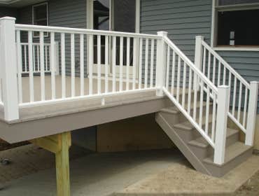 M Fox Builders, Miller Deck Newly built deck w/ composite decking and Azec railing.