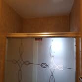 Bathroom remodeling Complete renovation of bathroom. Removed old bath tub and installed standing shower. Replaced toilet, vanity, mirror, lights, d
