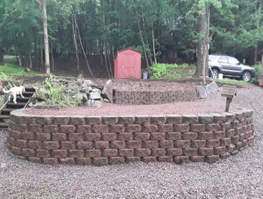 Pond & Waterfall Removal to Create Tiered Seating