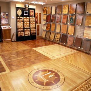 Our Showroom We have over 1500 square feet Hardwood Floors, in our showroom, to INSPIRE you. You pick your wood, custom stain color, design...