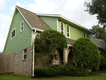 New LP SmartSide Siding, Replacement Windows & Seamless Gutters in Houston This is a Houston homeowner that wanted lower utility bills. We removed the 