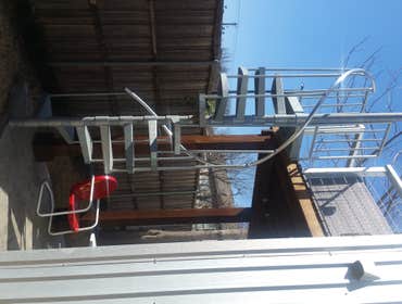 Covered Cedar Patio Addition with Spiral Staircase