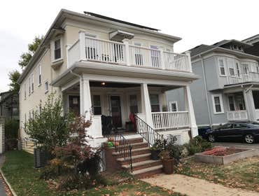 Somerville porch Rebuild and add deck to roof.