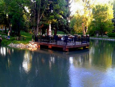 Deck Dock Trex Transcends with fortress Railing, Trex elevations metal framing, low voltage lighting, and outdoor sound system, custom flagstone patio.