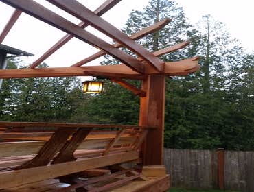 clear cedar pergola with lighting