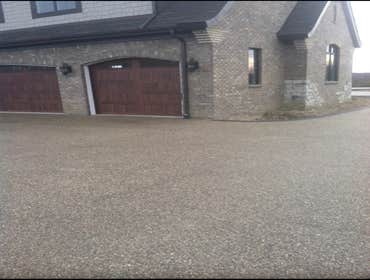 exposed aggregate Driveway Photo by Potoroka Concrete Macomb MI