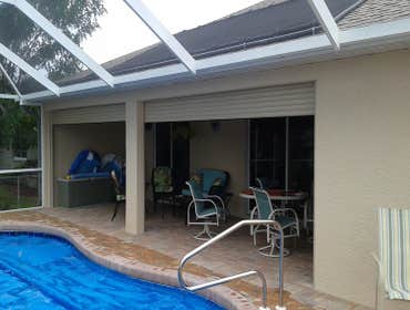 Photos from Precision Industries Sw Fl Inc One of our projects that consisted of 14 shutters including Lexan Clear Panels , Accordion Shutters and Elec