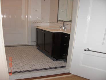 Project photos from Rc Home Improvement Contractors Llc BATHROOM:with mosaic tile on the floor, custom shower base,knee wall, frame less shower door,ti