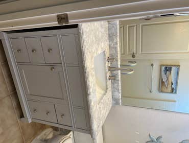 Install new vanity and faucet plumbing