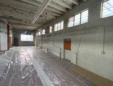 Photos by Northeast Eco Blasting #5 Old shop wall and ceiling coating removal