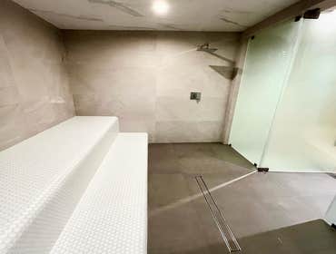Bathroom Remodel Our newly remodeled high-end steam room is a masterpiece of luxury and sophistication. From the exquisite tile work to the state-of-th