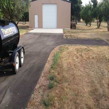Apshalt Driveway Sealcoat This asphalt was allowed to cure for 1 year prior to sealcoating.