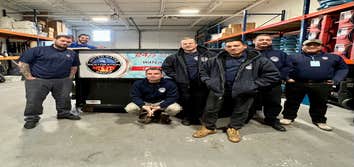 The Crew with UWRG Dumpster