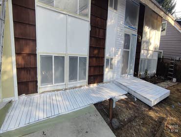 Saul's Quality Painting LLC Project #1 Initially Just a repainting of the home, later the client asked to add the painting of the deck to the job agree